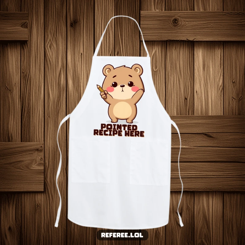 Funny determined bear energetically pointing with a tiny pencil on an apron, directing kitchen tasks humorously.