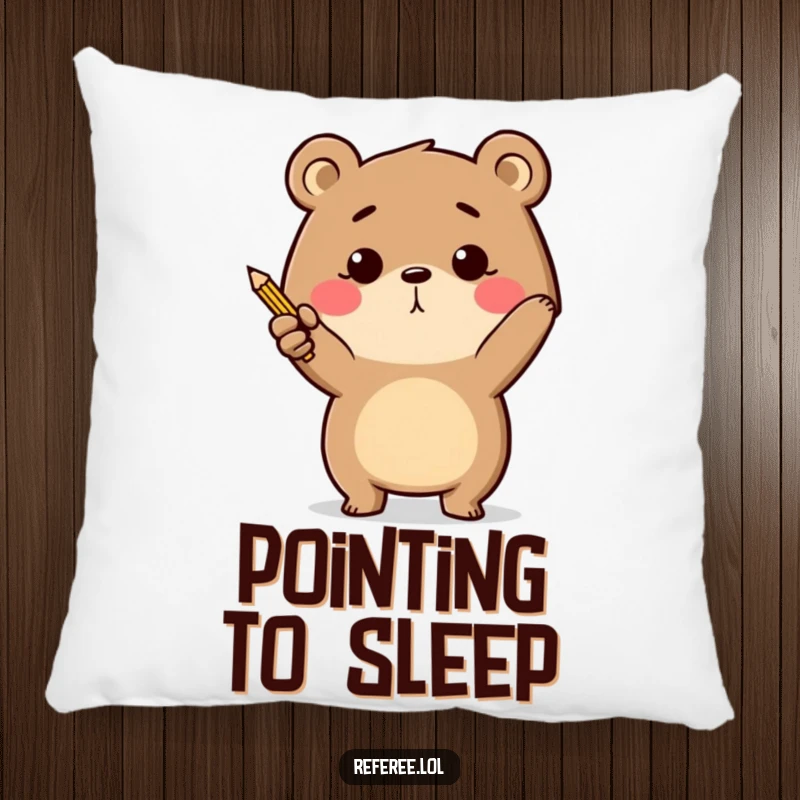 Funny determined bear energetically pointing with a tiny pencil on a pillow, providing comfort and inspiration.