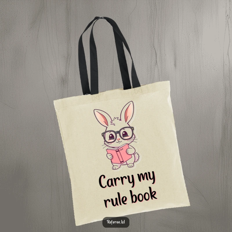 Funny tote bag with a shy bunny adjusting oversized glasses and holding a rule book, perfect for organized and cheerful carrying.
