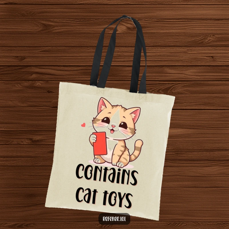 Funny cat tote bag with a cute kitten actively swatting at a small red card, perfect for carrying groceries or daily items.
